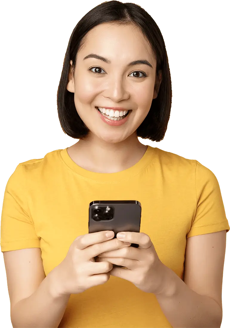 smiling asian woman using mobile phone