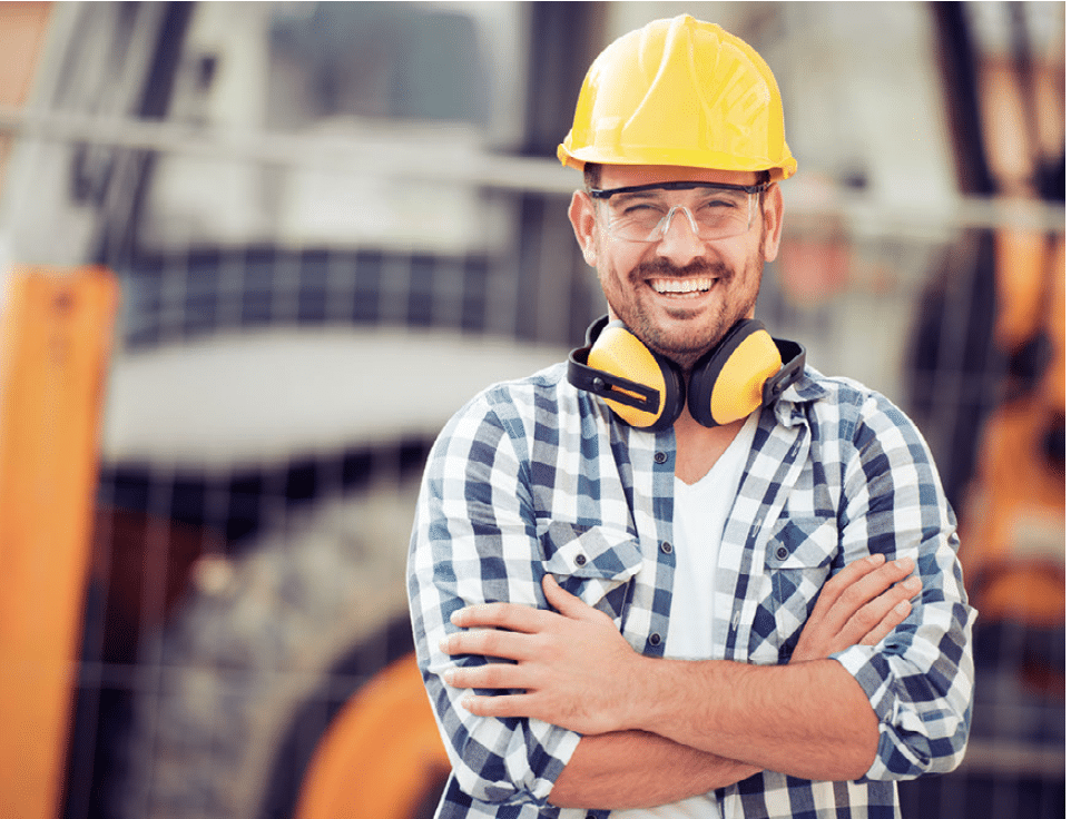 smiling construction worker in plaid shirt. on-demand staffing