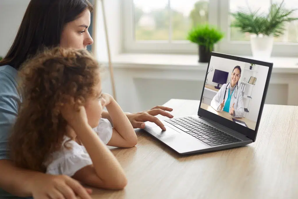 mother and child using telemedicine