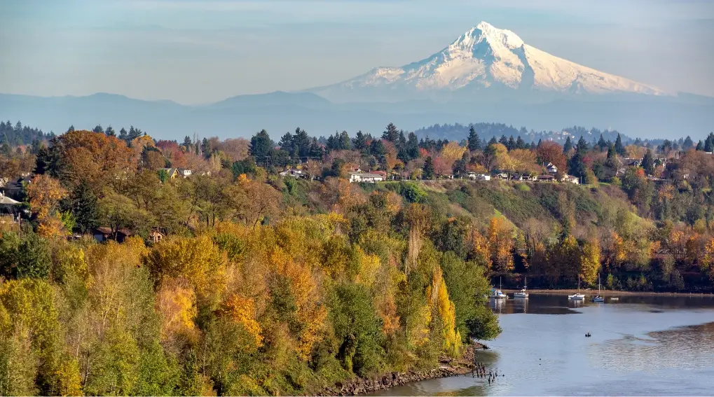 portland oregon with snow capped mountain behind and fall foliage