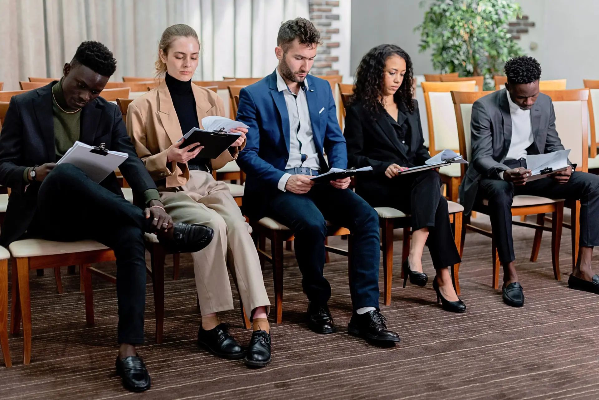 Variety of applicants waiting for an interview.